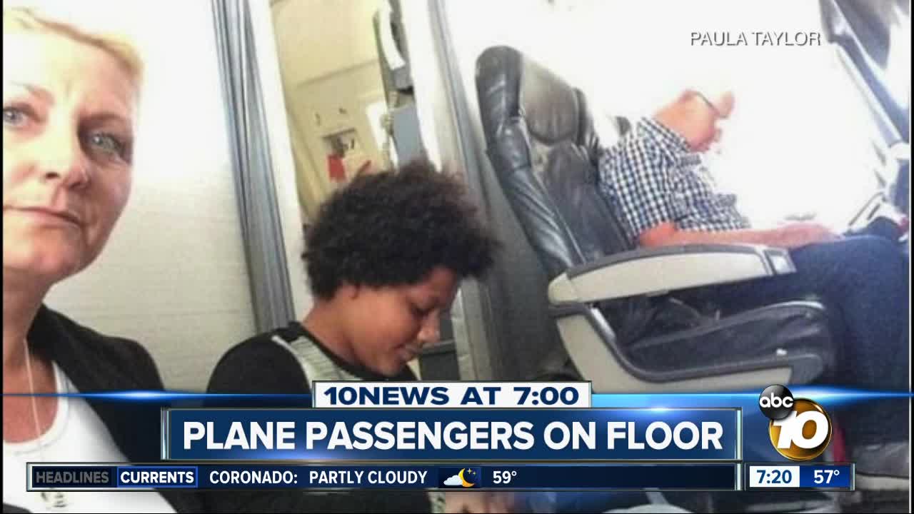 Plane passengers forced to sit on the floor?