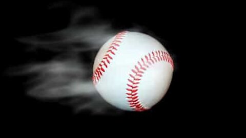 Woman blows out candle with amazing baseball pitch