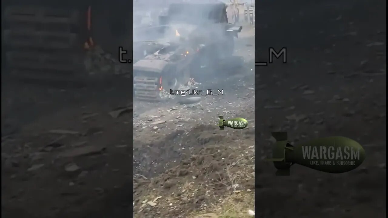 Smouldering T-72 tank with its turret blown off