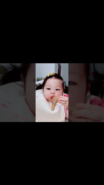 Delicious food 😋 Cute adorable baby child with warm white and pink hat with cute baby girl(4)