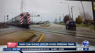 Dash cam shows Illinois officer's close call with train