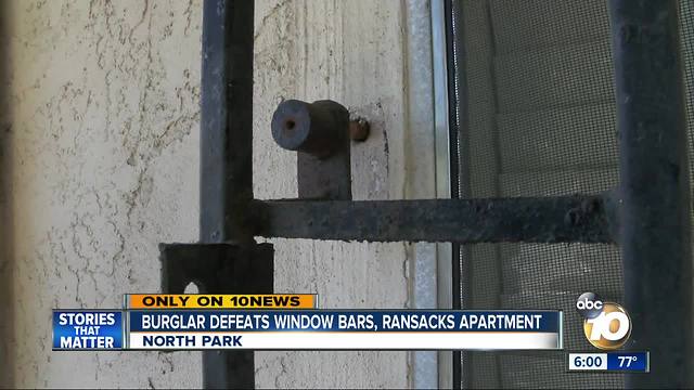 Burglar defeats window bar, ransacks apartment