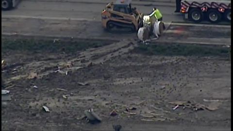 Overturned semi spills large rolls of paper onto I-271 southbound at the I-480 split