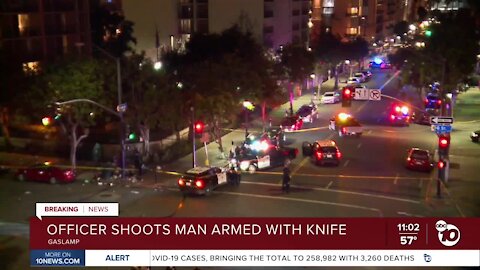 Officer shoots man armed with knife