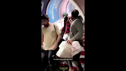 Puneet Superstar got Beaten up by a Random guy while deporting from Plane