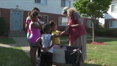 Storyteller is connecting with neighborhood kids and sharing the gift of books