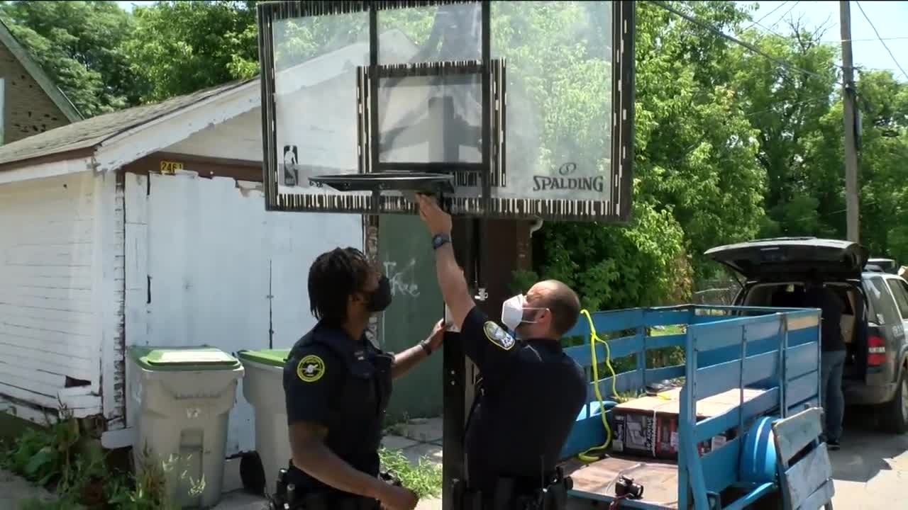 Milwaukee police donate basketball hoops to kids in the community