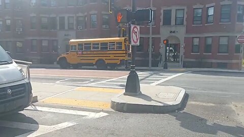 Boston police investigating motor vehicle struck by school bus