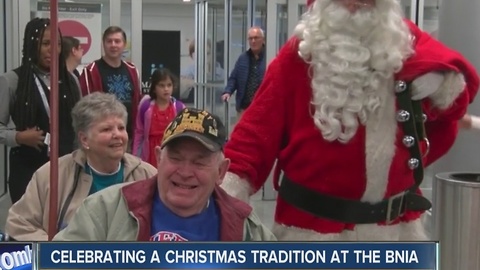 Santa Claus making sure everyone is welcomed home