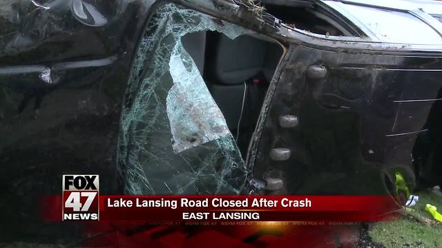 Pickup truck hits vehicle, power pole before rolling on side