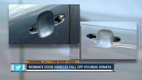 Door handle defect forces woman to crawl through the back of her car to get to the driver's seat