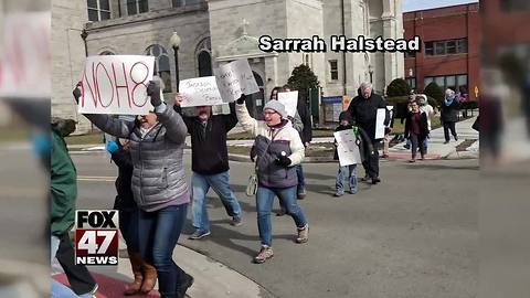 Protesters call for county sheriff to resign amid lawsuit