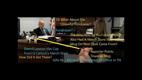 Q Carlock's Merch Store Mug From Summer Wells Scamathon On Sheriff Ron Lawson's Desk