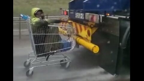 GROCERIES TROLLEY RIDER HANGS ON TO FUEL TANKER ON HIGHWAY! 