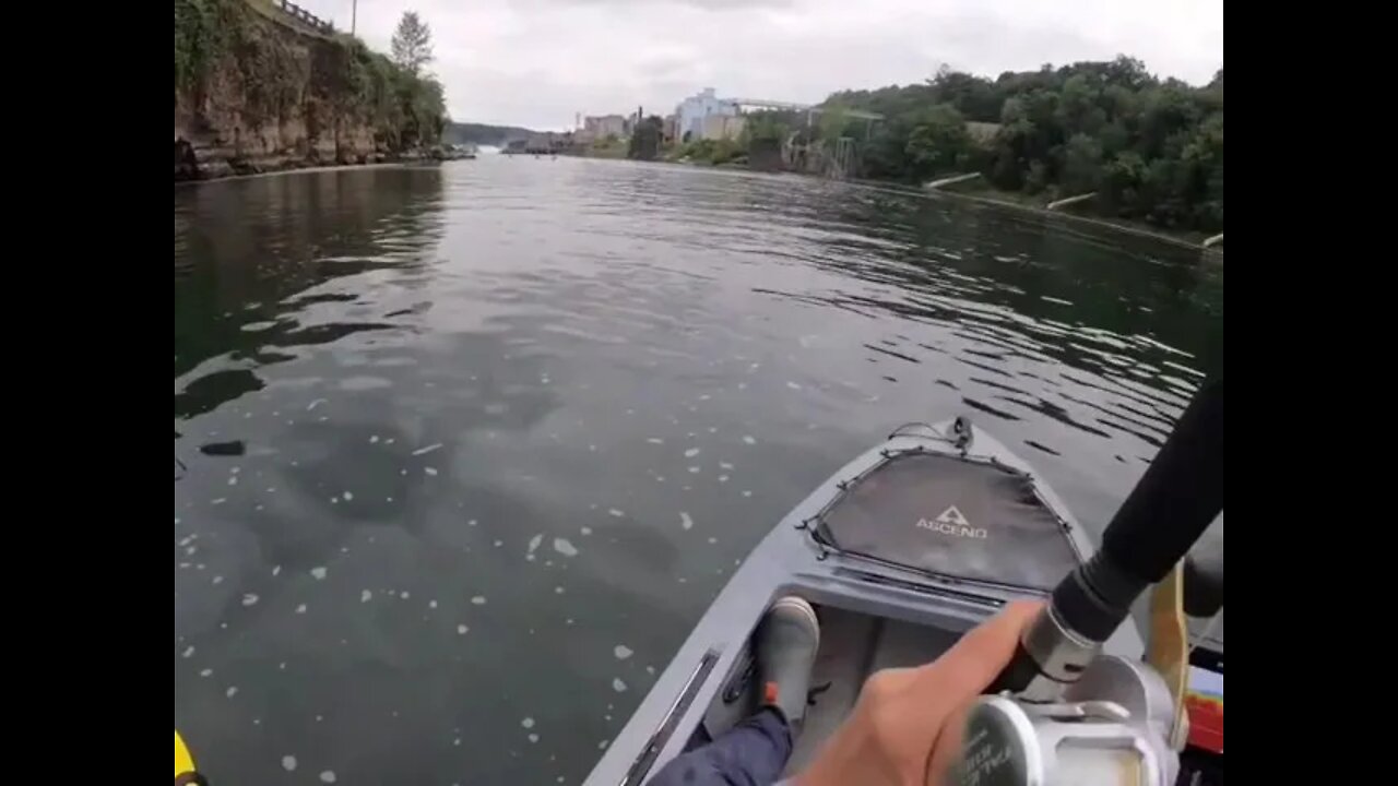 Man Fishing ALONE IN A BOAT Catching Fish using a fish rod