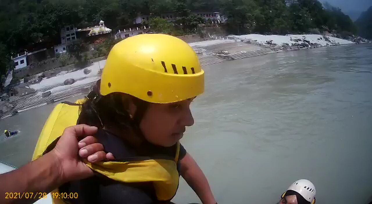 scarry lady during water rafting