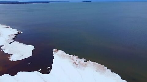 Winter Aerial Drone Footage of the Mouth of the Au Train River in Au Train, Michigan.