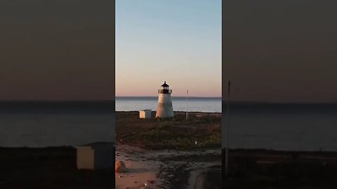 Sunrise drone fly over Bird Island Light in Marion, MA