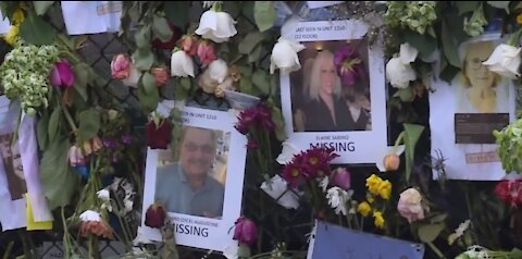 People continue to show up in Surfside to pay their respects
