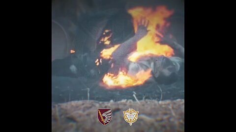 A video about the adventures of a Russian 'Terminator' crawling out from under a BMP wrapped in flames