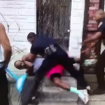 Baltimore officer repeatedly hits man