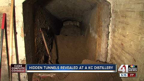Local distillery exploring tunnel in building
