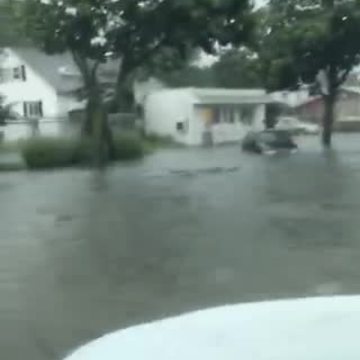 Capitol Dr. in Wauwatosa floods Monday