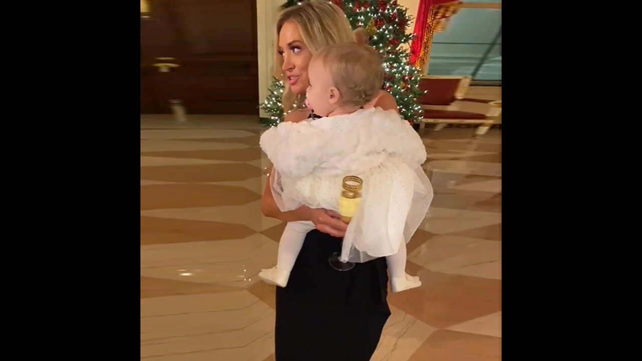 The Gorgeous Kayleigh McEnany & her baby dancing to the Marine band playing Frozen.