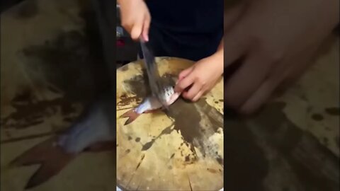 Beautiful Chinese Girl Chef Is Quick With A Knife Cutting Up A Little Fish Part 1