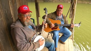 Hillbillies Jamming On Homemade House Boat