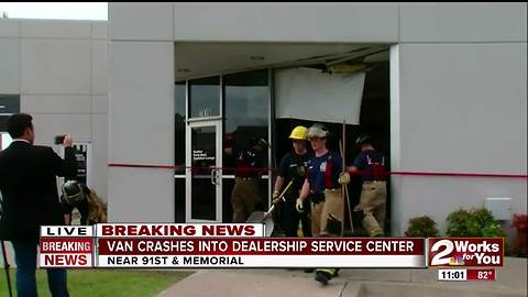 Vehicle crashes into car dealership near 91st Memorial