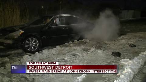 Water main break trapping cars in southwest Detroit