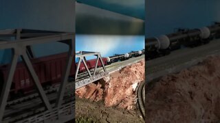 N Scale BNSF Dash 9s crossing a bridge