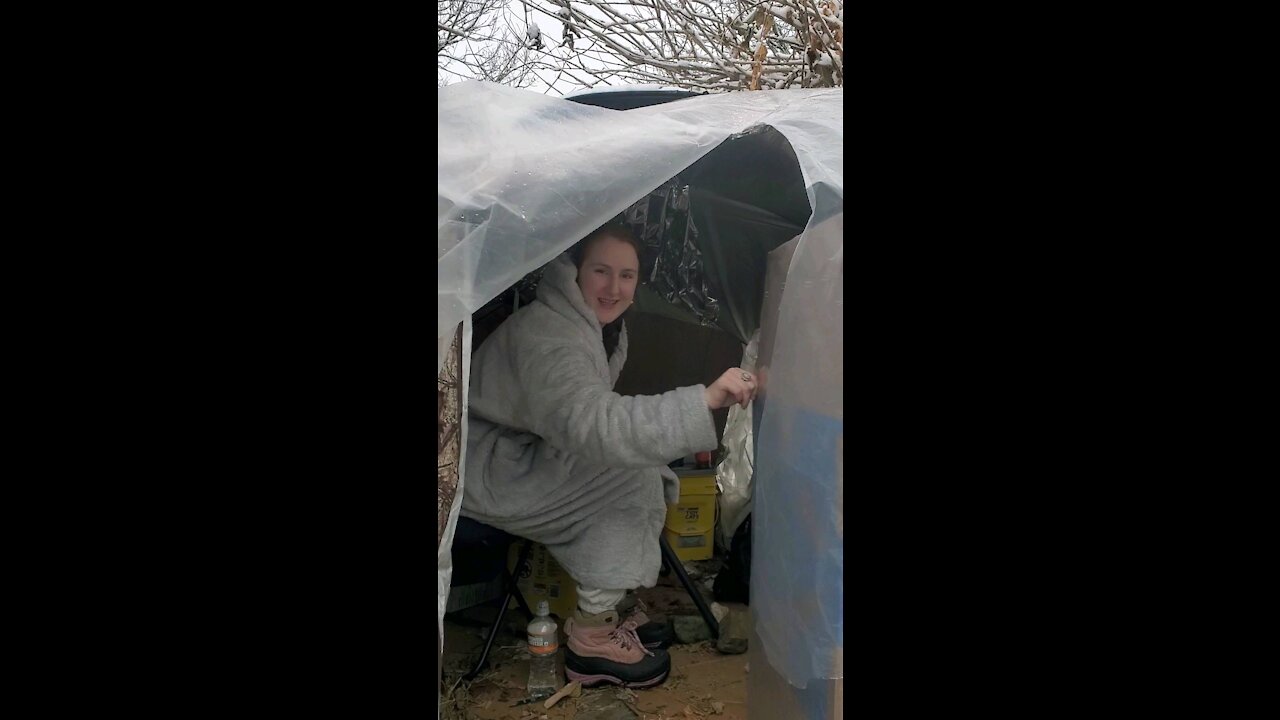 Showing off the outside of the hut