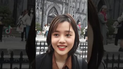 Fashion For Buddhist Girls To Pose At The Catholic Cathedral