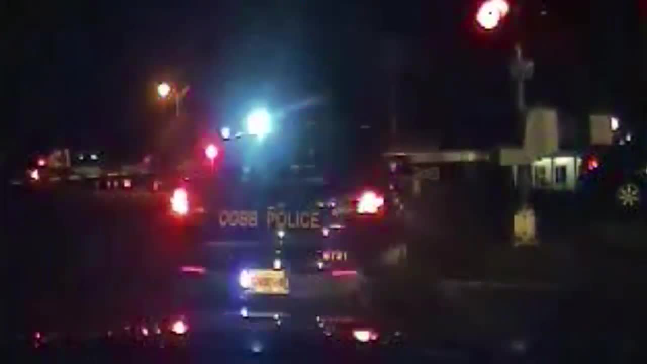 Police pull man from car stopped on tracks seconds before train hits