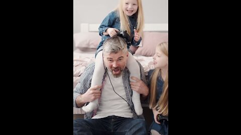 A Father and His daughters have some fun