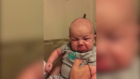 Cute Baby Makes A Face When His Dad Kisses Him