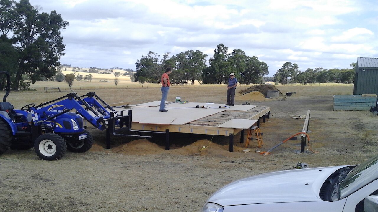 Building the kit home 09 - Floor panels. Is three months in the weather really good for your floors?