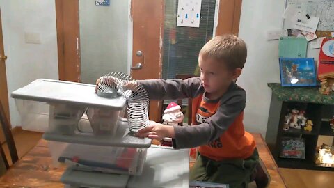 Experimenting With a Slinky in Slow motion