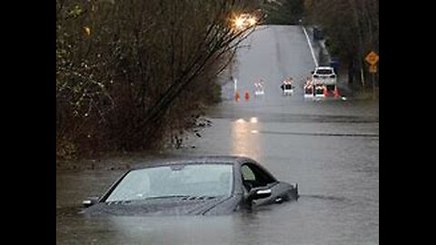 Dam discharges** river burst** flash flood submerges**