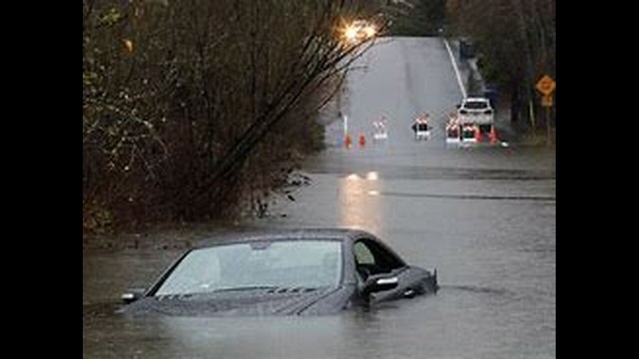 Dam discharges** river burst** flash flood submerges**