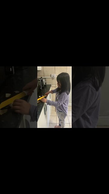 Baby girl is cooking scrambled eggs and mommy is cooking veggies