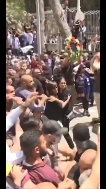 Israeli forces beating crowds carrying casket of Shireen Abu Akleh who they just assassinated!!!