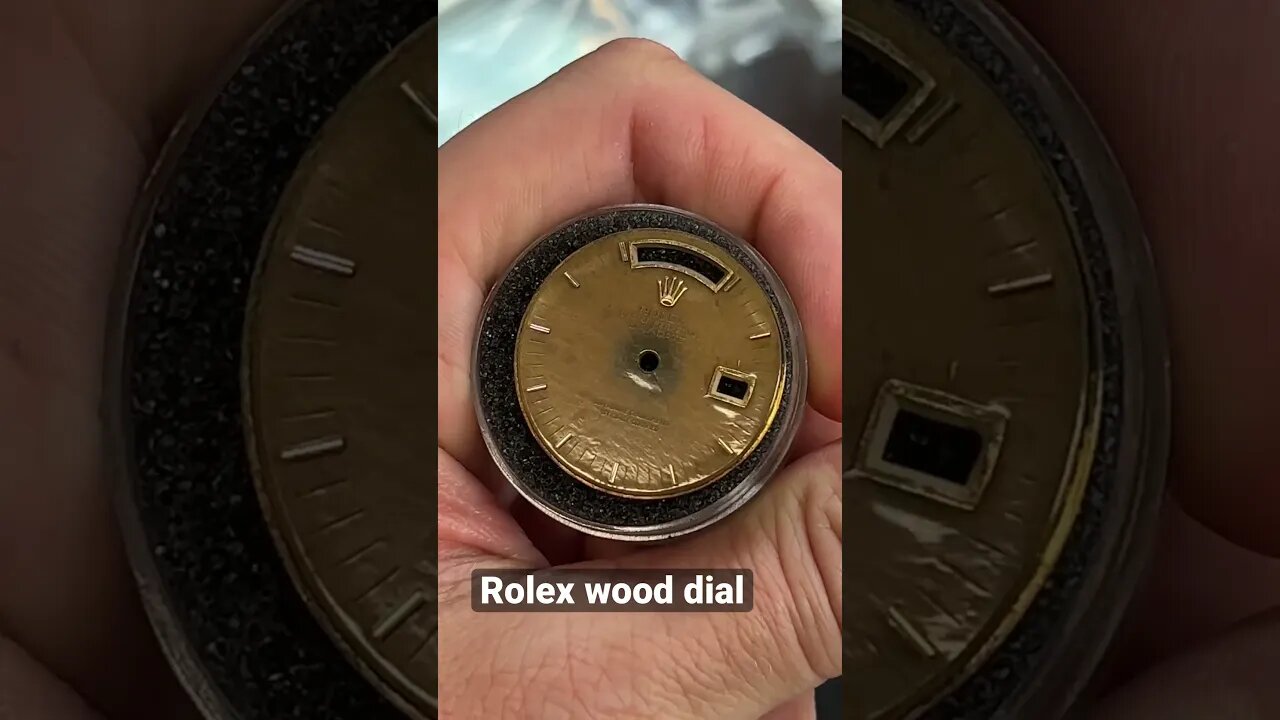 A Look at a Rolex Day-Date wood dial that has been damaged.