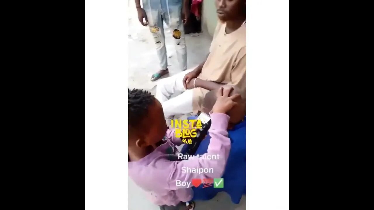 Teach Them Young: Boy seen giving his mate a haircut