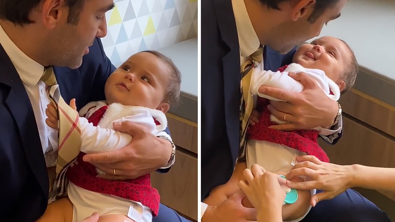 Dad Adorably Distracts Baby During Doctor's Visit