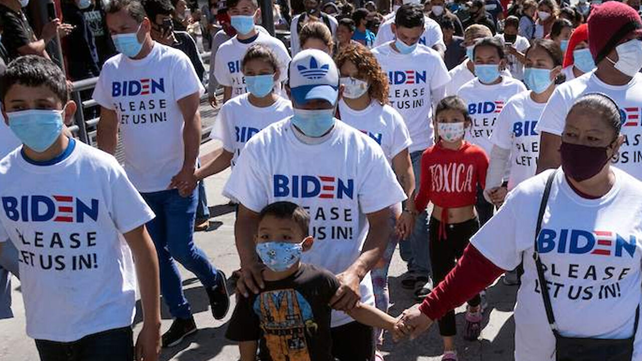 Migrants Arrive At Southern Border Wearing Biden T-Shirts