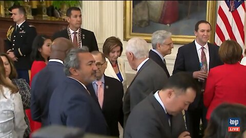 Despite Fining 4 House Members, Pelosi Wears No Mask While Walking Through Crowd