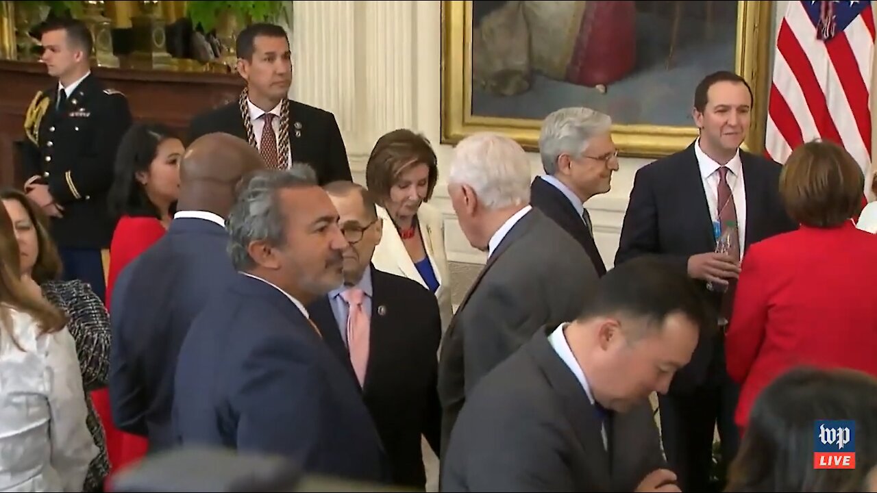 Despite Fining 4 House Members, Pelosi Wears No Mask While Walking Through Crowd